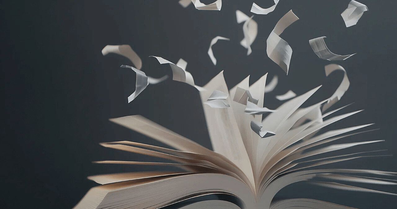 Livro com folhas a voar, simbolizando a perda de conteúdo ou erros de copywriting no texto.